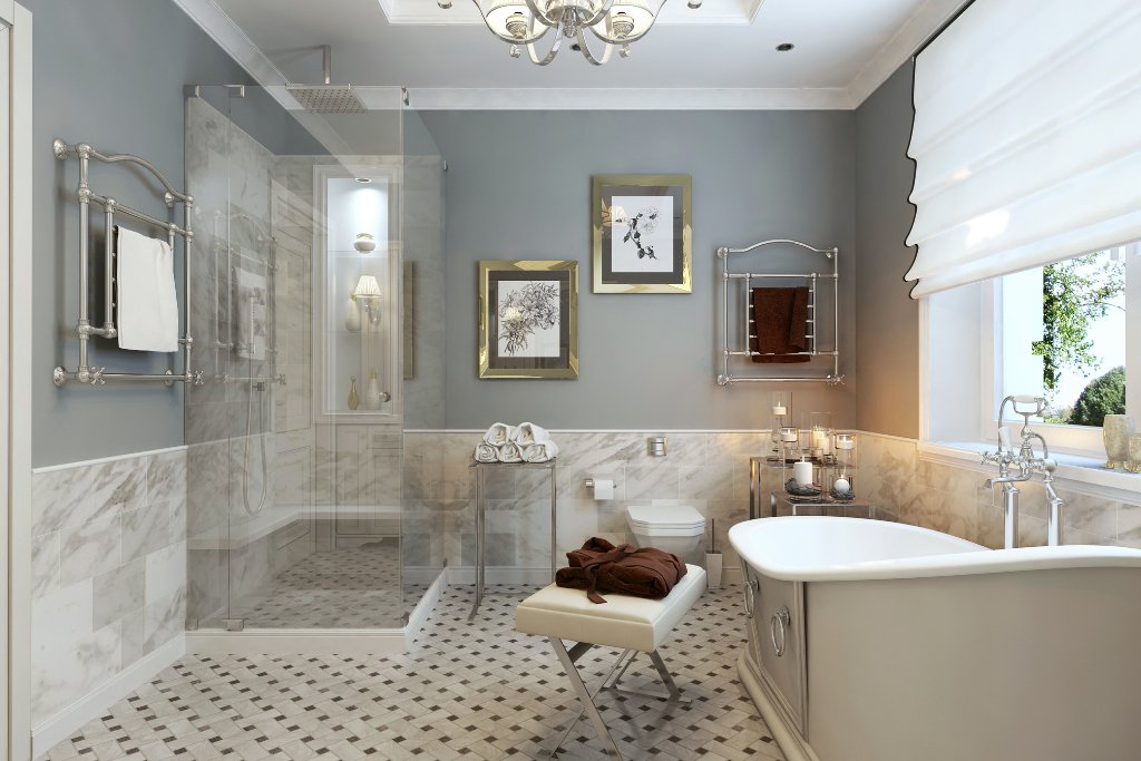 bagno in marmo con doccia e vasca