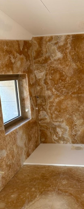 bagno in onice cuneomarmi